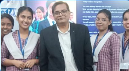 A PragatiPath 360 mentor with school students at a recognition event